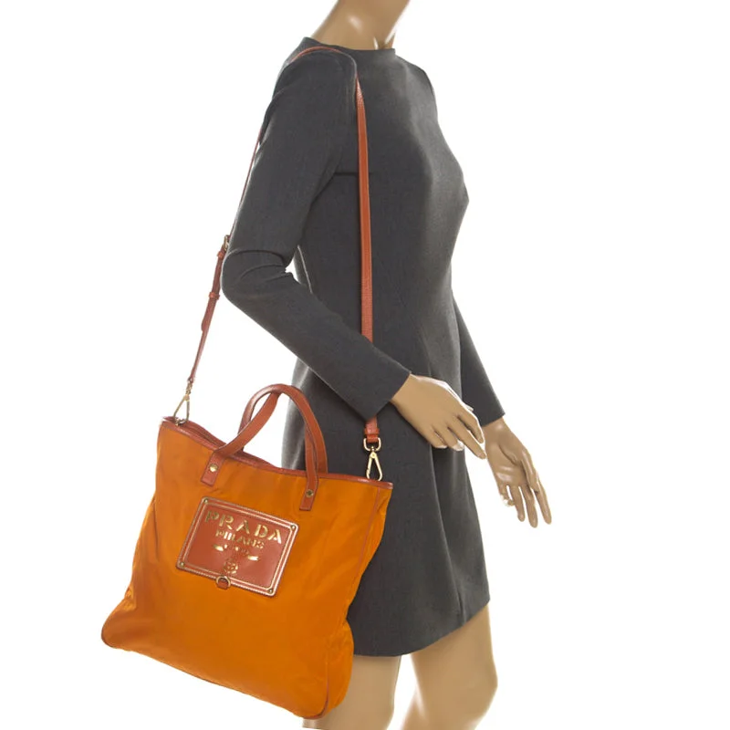 Crossbody bags for everyday usePrada Orange Nylon and Leather Lasercut Logo Tote