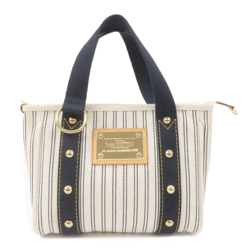 Affordable designer bag dupesLouis Vuitton Antigua Cabas PM Tote Hand Bag Navy Stripe M40134